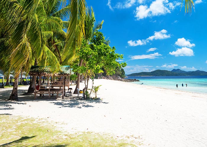 CYC Beach with white sand and clear waters